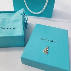 Tiffany & Love ampersand charm in 18k rose gold, medium